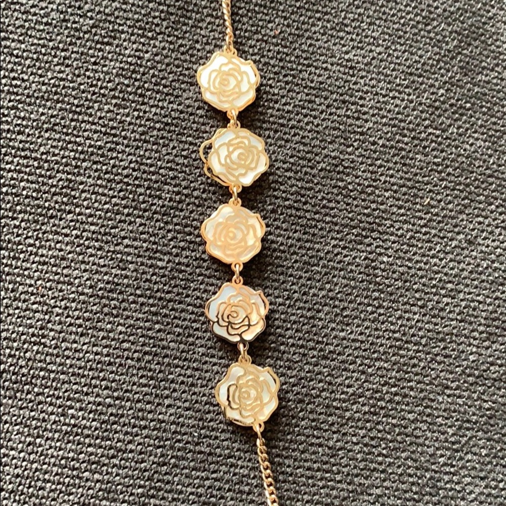 New gold mother of pearl camellia bracelet
